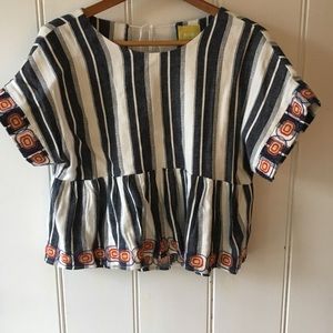 Cute cropped top that opens and ties in the back.